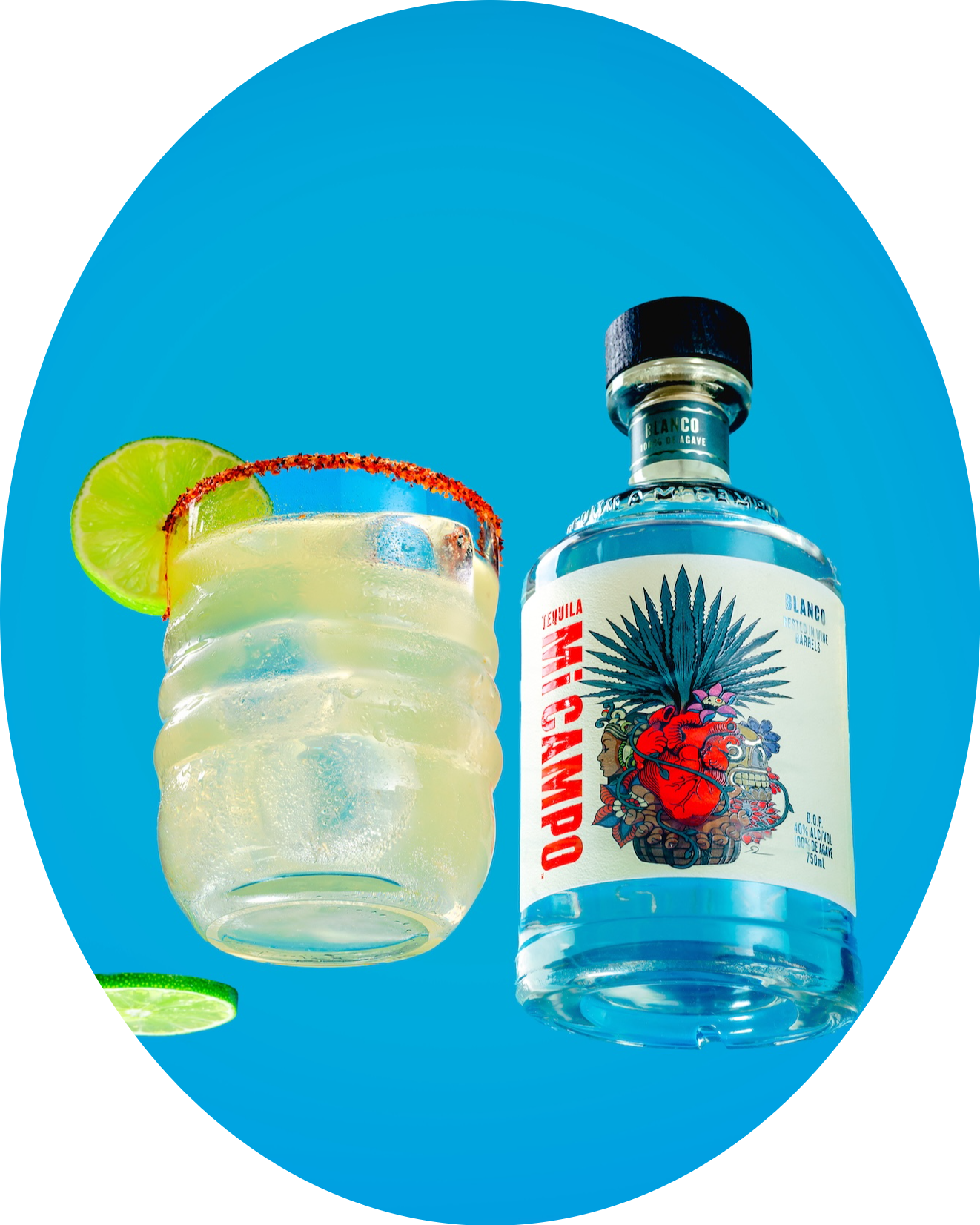 Bottle of Mi Campo with a cocktail garnished with lime on a blue background